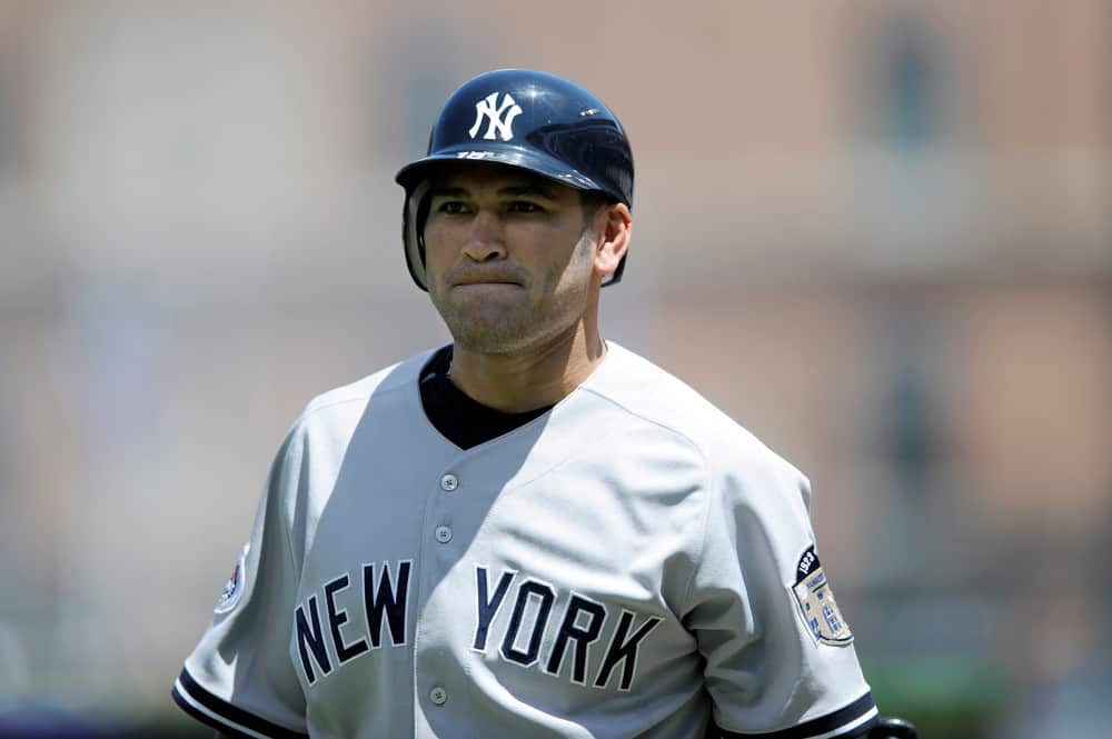 New York Yankees left fielder Johnny Damon (18) walks back to the dugout after striking out against the Baltimore Orioles at Camden Yards in Baltimore, MD. The Orioles defeated the Yankees 6-1