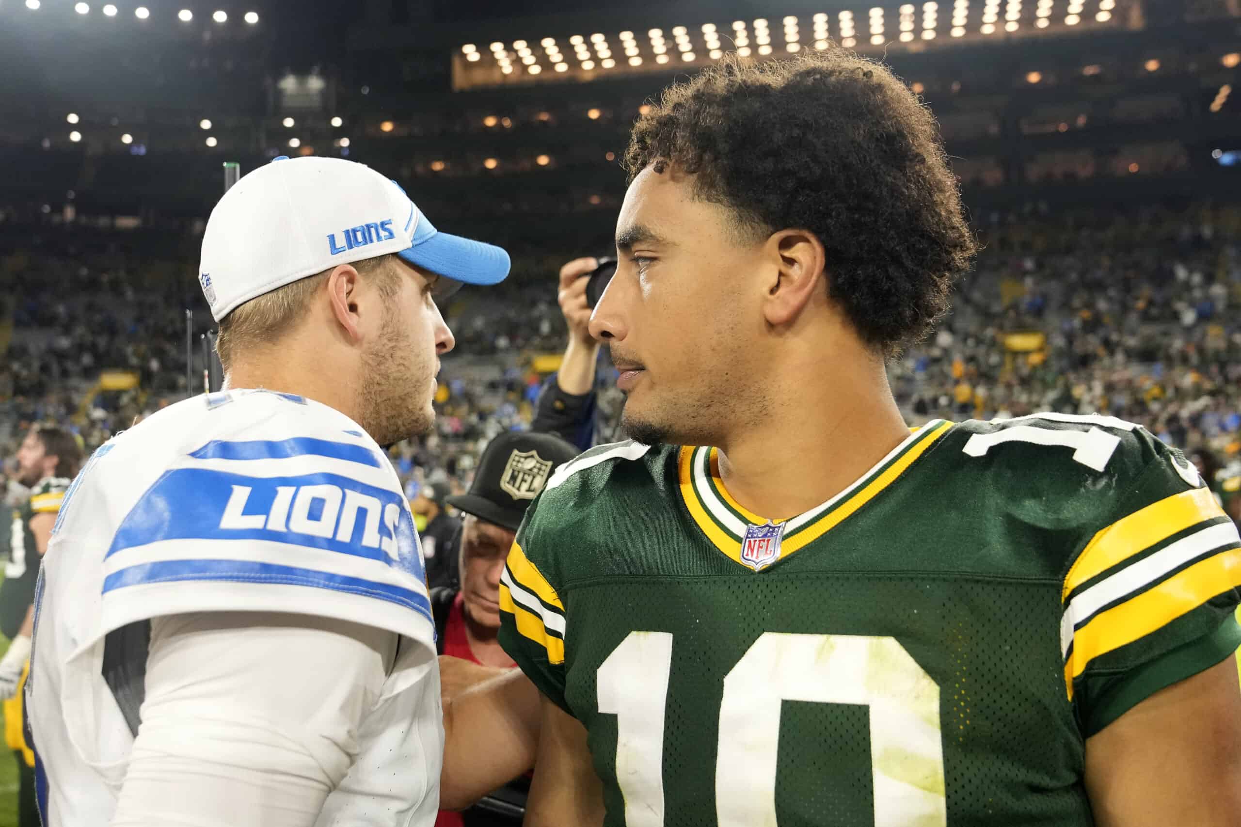 GREEN BAY, WISCONSIN - SEPTEMBER 28: Jordan Love #10 of the Green Bay Packers congratulates Jared Goff #16 of the Detroit Lions after the game at Lambeau Field on September 28, 2023 in Green Bay, Wisconsin.