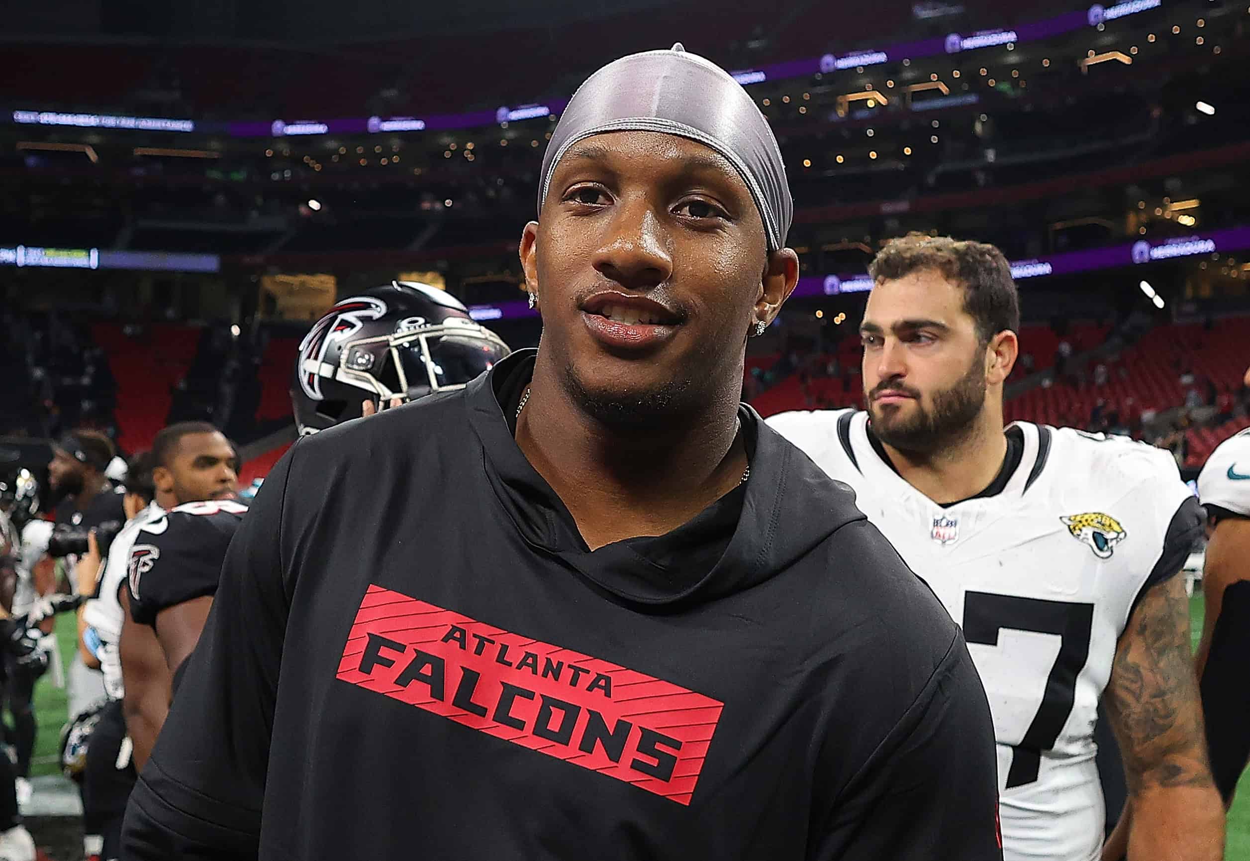 ATLANTA, GEORGIA - AUGUST 23: Michael Penix Jr. #9 of the Atlanta Falcons reacts after their 31-0 loss to the Jacksonville Jaguars at Mercedes-Benz Stadium on August 23, 2024 in Atlanta, Georgia.