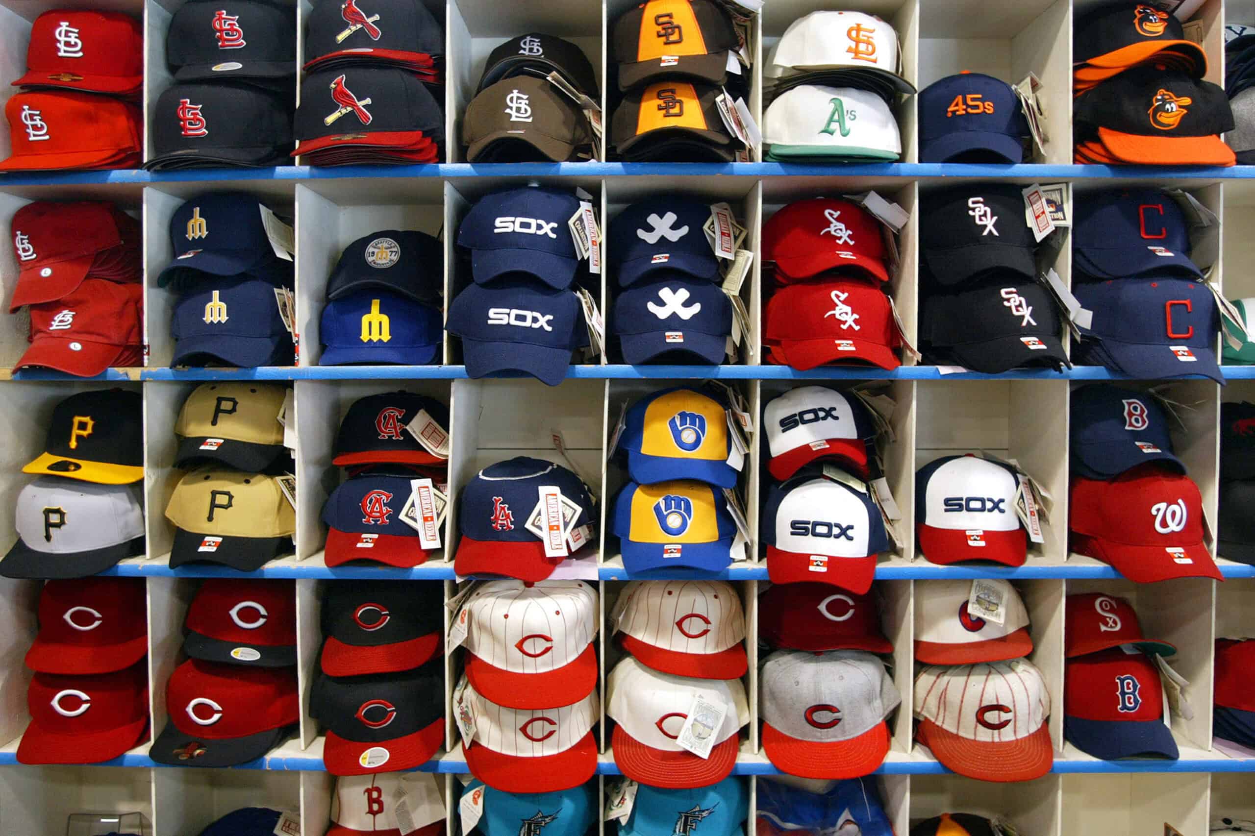 CHICAGO - AUGUST 27: Various team baseball caps are displayed at the Sports World souvenir store across the street from Wrigley Field, home of Major League Baseball's Chicago Cubs, August 27, 2002 in Chicago, Illinois. The players union has set a strike deadline of August 30.