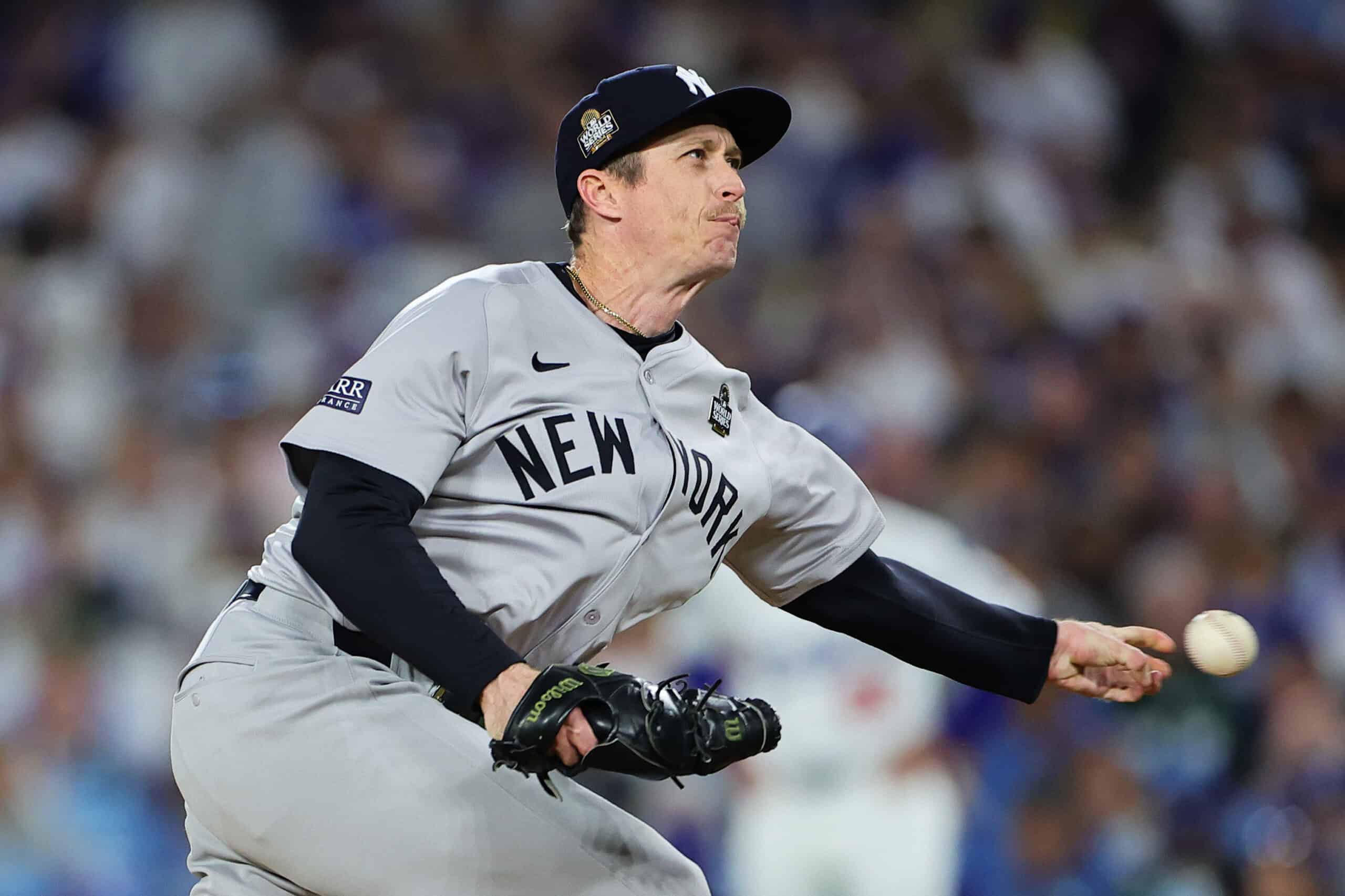 LOS ANGELES, CALIFORNIA - OCTOBER 26: Tim Hill #54 of the New York Yankees pitches in the sixth inning against the Los Angeles Dodgers during Game Two of the 2024 World Series at Dodger Stadium on October 26, 2024 in Los Angeles, California.