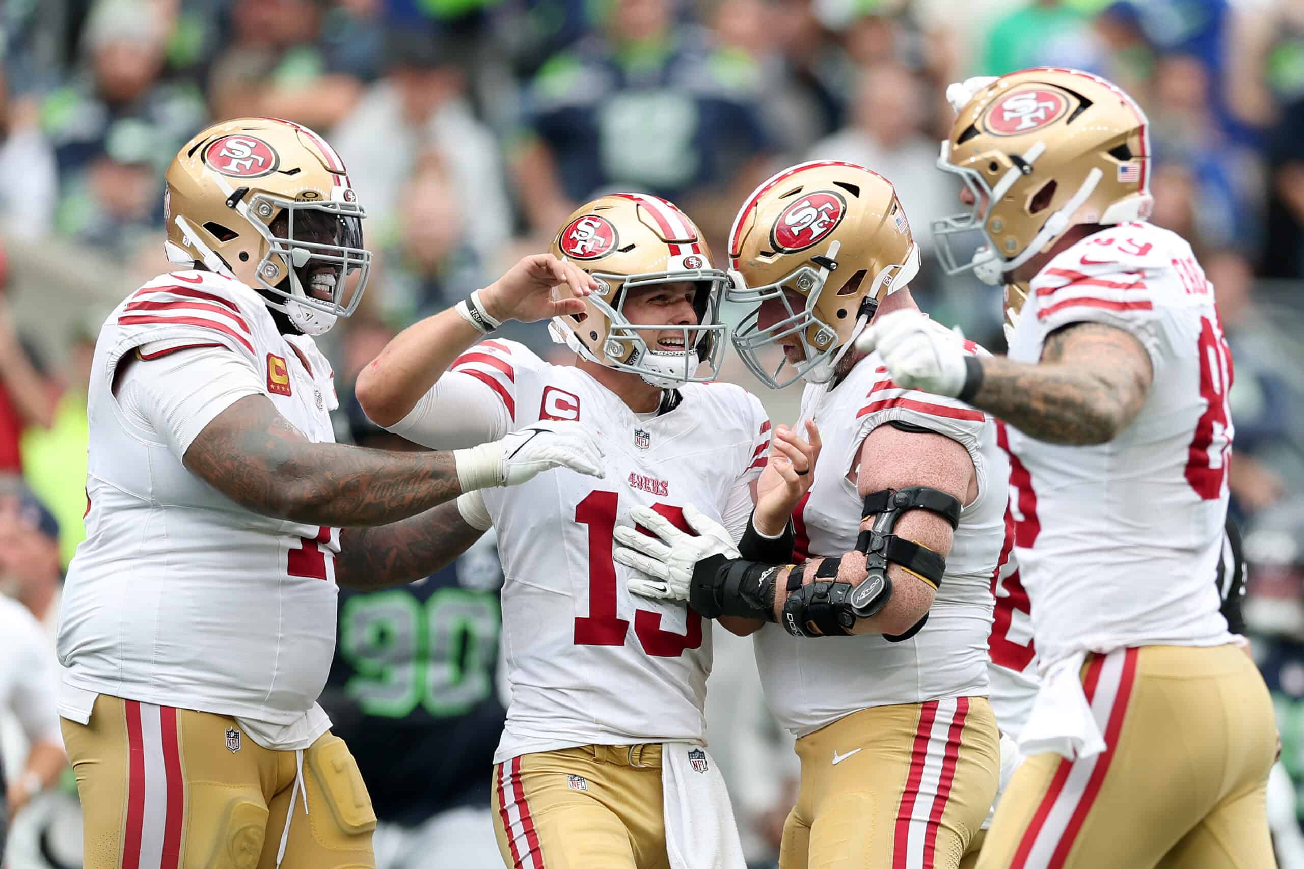SEATTLE, WASHINGTON - SEPTEMBER 07: Brock Purdy #13 of the San Francisco 49ers celebrates after a touchdown during the NFL 2025 game between San Francisco 49ers and Seattle Seahawks at Lumen Field on September 07, 2025 in Seattle, Washington.