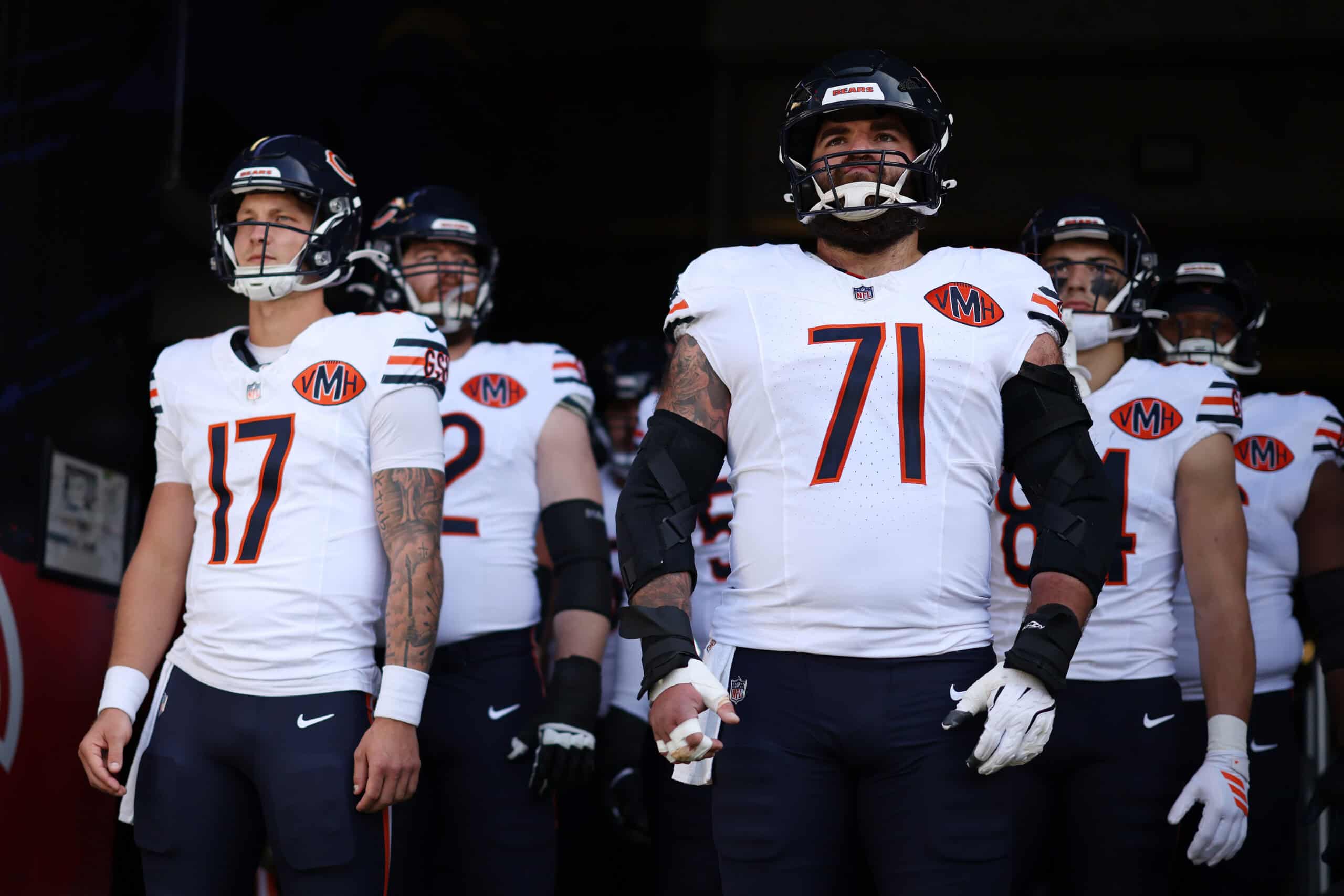 BALTIMORE, MARYLAND - OCTOBER 26: Ryan Bates #71 of the Chicago Bears looks on from the tunnel prior to the game against the Baltimore Ravens at M&T Bank Stadium on October 26, 2025 in Baltimore, Maryland.