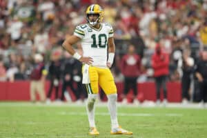 GLENDALE, ARIZONA - OCTOBER 19: Jordan Love #10 of the Green Bay Packers looks to the bench during the fourth quarter of the NFL game against the Arizona Cardinals at State Farm Stadium on October 19, 2025 in Glendale, Arizona. The Packers defeated the Cardinals 27-23.