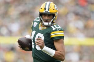 GREEN BAY, WISCONSIN - OCTOBER 12: Jordan Love #10 of the Green Bay Packers carries the ball during the first quarter in the game against the Cincinnati Bengals at Lambeau Field on October 12, 2025 in Green Bay, Wisconsin.