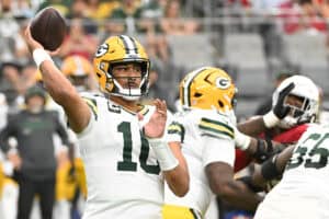 GLENDALE, ARIZONA - OCTOBER 19: Jordan Love #10 of the Green Bay Packers looks to pass in the first quarter of a game against the Arizona Cardinals at State Farm Stadium on October 19, 2025 in Glendale, Arizona.