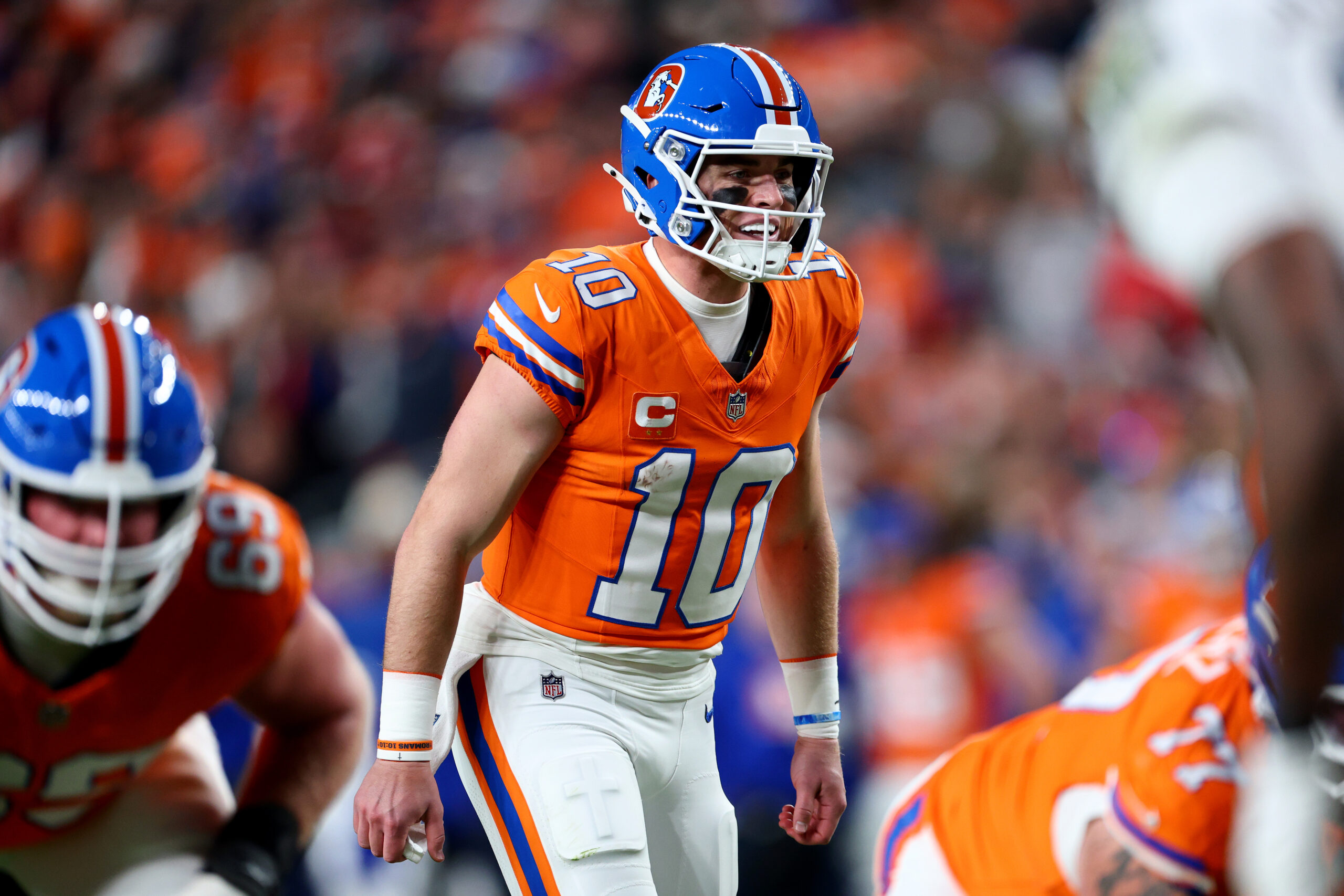 DENVER, COLORADO - NOVEMBER 06: Bo Nix #10 of the Denver Broncos calls a play against the Las Vegas Raiders during the second quarter in the game at Empower Field At Mile High on November 06, 2025 in Denver, Colorado.
