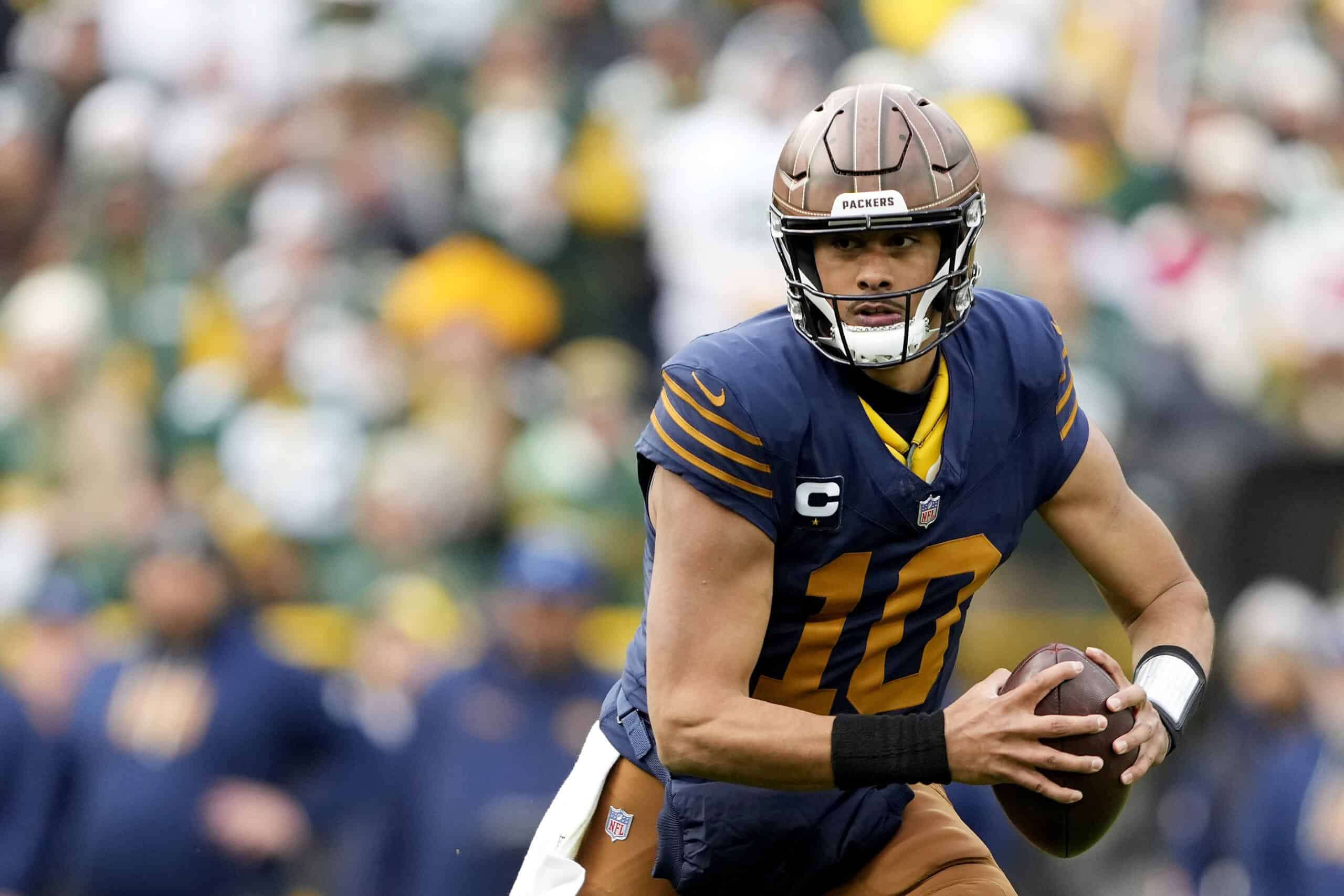 GREEN BAY, WISCONSIN - NOVEMBER 02: Jordan Love #10 of the Green Bay Packers runs the ball during the third quarter against the Carolina Panthers in the game at Lambeau Field on November 02, 2025 in Green Bay, Wisconsin.